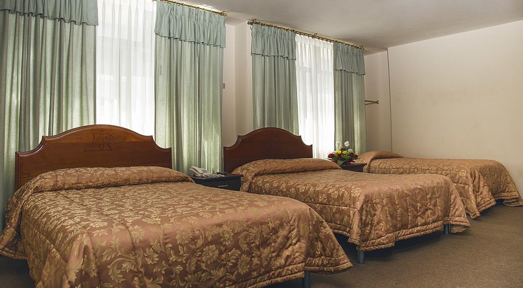Hotel Podocarpus Loja Chambre photo
