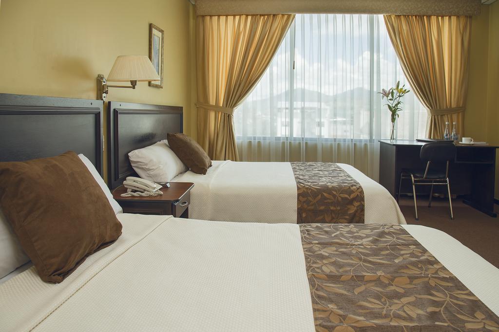 Hotel Podocarpus Loja Chambre photo